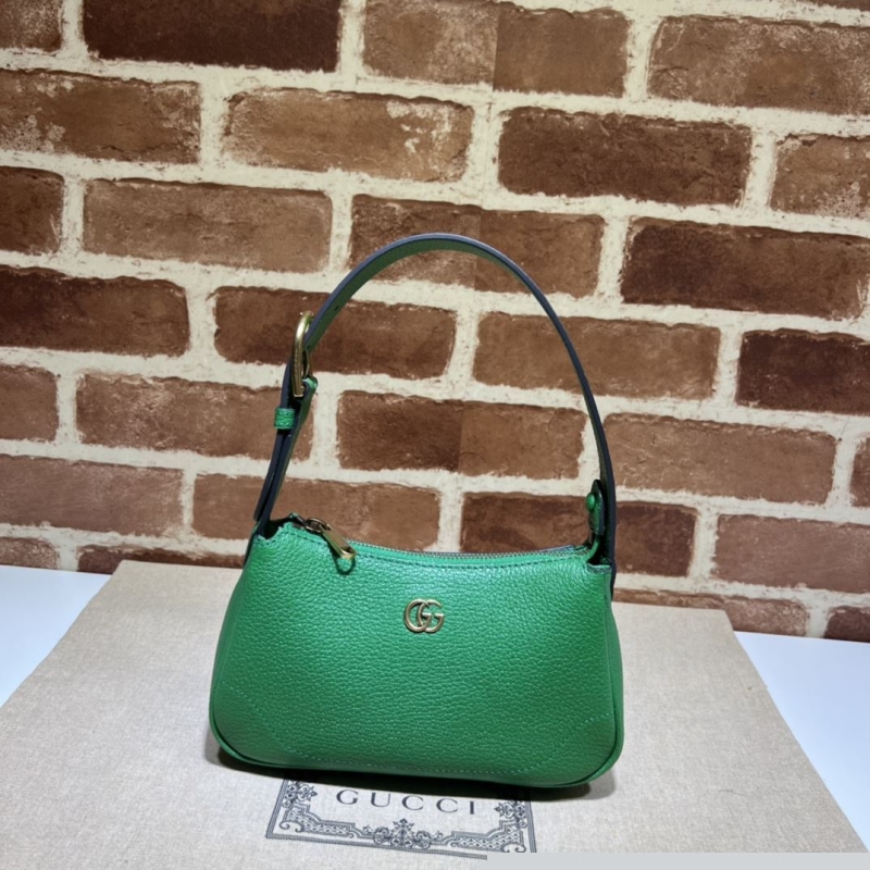 G*u*i top handle bags